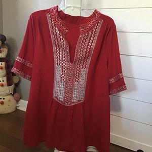 Red top with embroidery